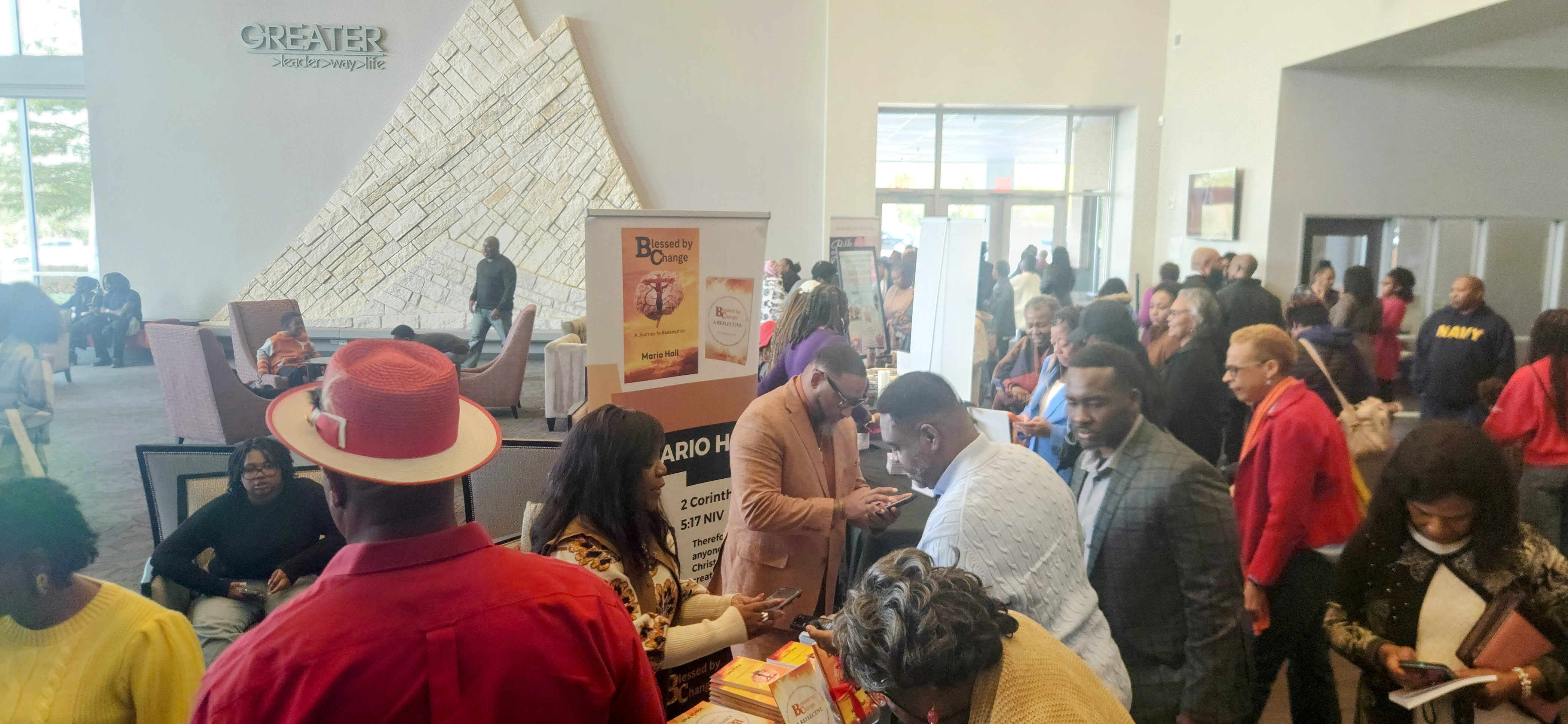 Mario Hall at Greater Mount Zion Church book signing event - crowd gathering