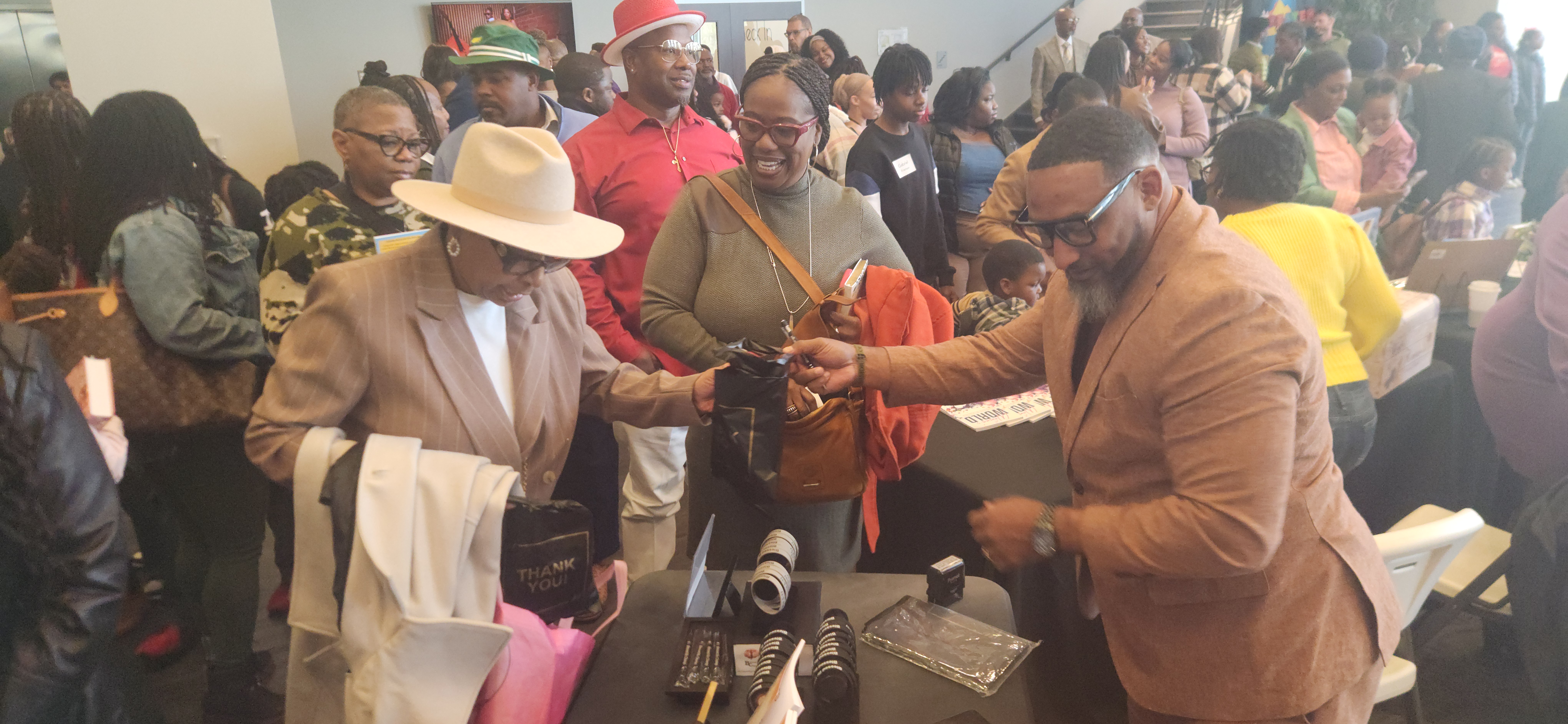 Mario Hall engaging with attendees at Greater Mount Zion Church
